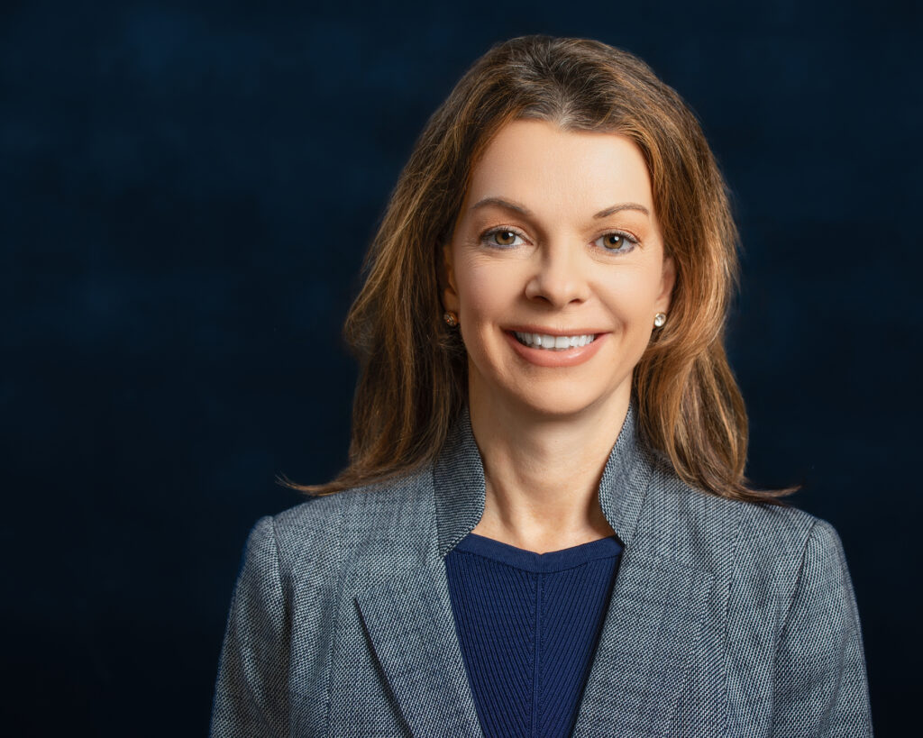 Female business executive looking at camera for professional headshots