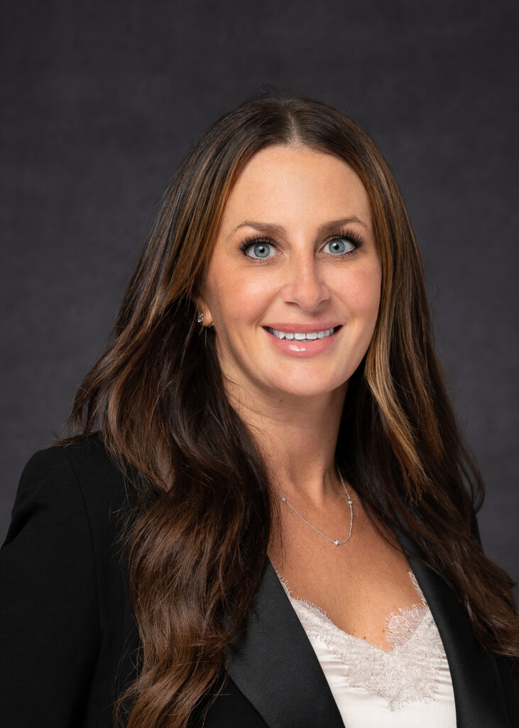 Corporate Officer looking at camera for her professional headshot