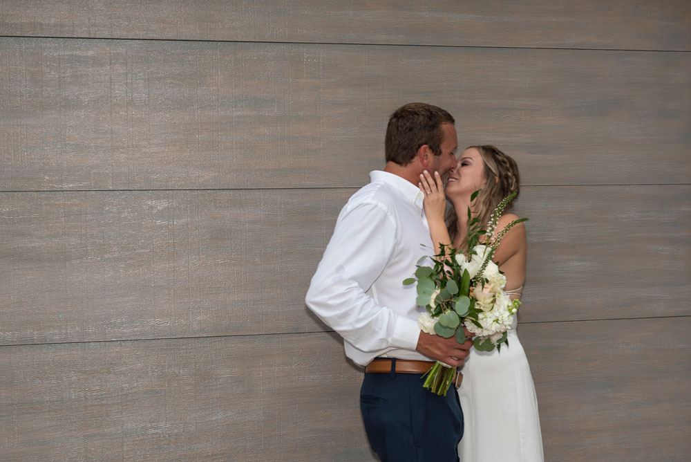 wedding photo of a couple kissing