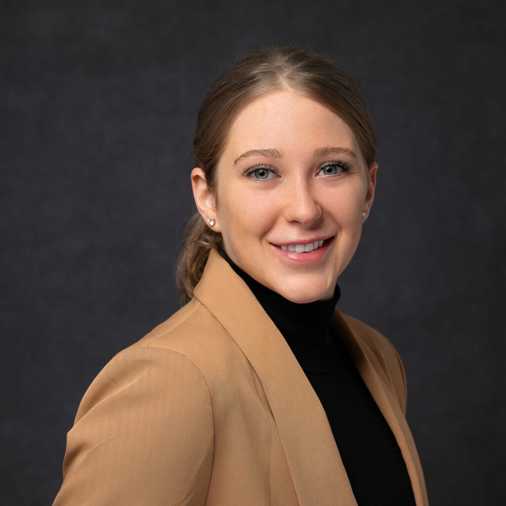 Financial Services Executive Smiling in Professional Headshot