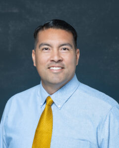 Transitioning military person smiling and looking at camera for new professional headshots