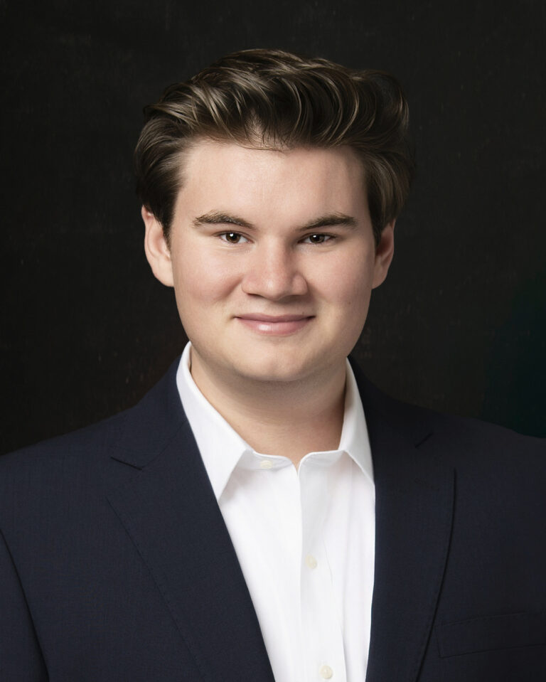 CFO of local company posing for his professional headshots in Jacksonville