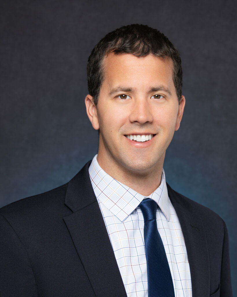Executive team member looking at camera for on-location professional headshots