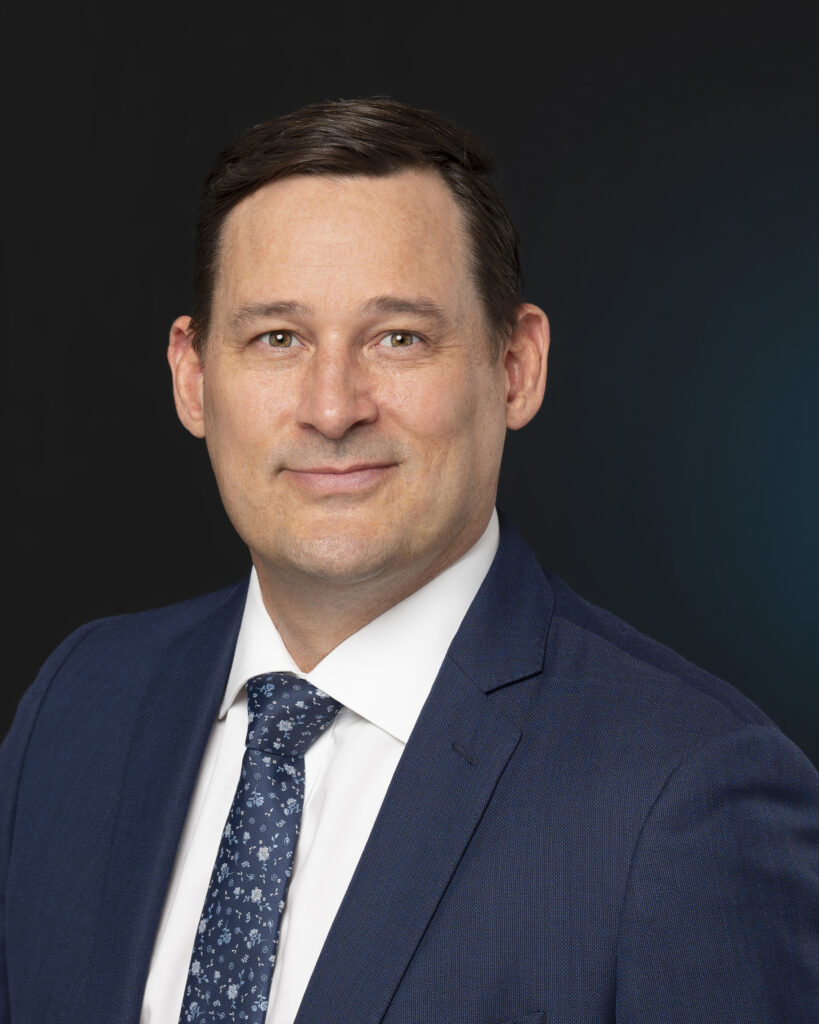Pharmaceutical Executive looking at camera for professional headshots and LinkedIn Profile photos