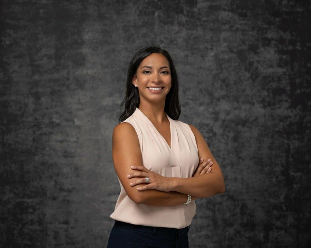 lady smiling for a studio headshot