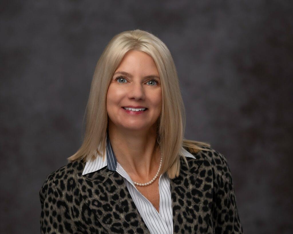 lady smiling for a business professional studio headshot