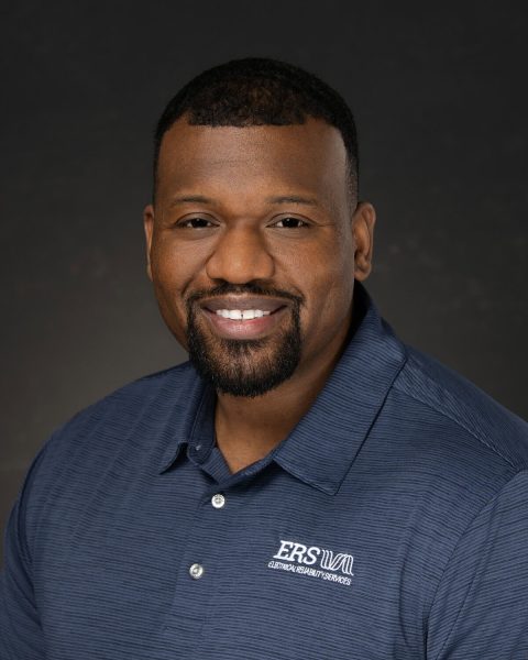 Business professional looking at camera for group professional headshots